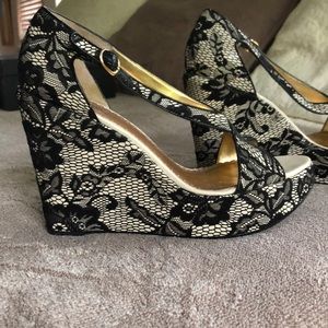 Hale Bob black lace over tan leather wedge.